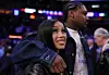 Stefon Diggs with his arm around Cardi B.