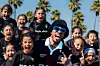 Anderson .Paak in a photo with a youth soccer team.