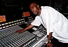 Songwriter and record producer Rico Wade poses for photos while at work in 'The Dungeon' on location in Atlanta, Georgia on April 1, 2001.
