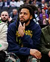 J. Cole attends the NBA game between the Toronto Raptors and the Charlotte Hornets at Scotiabank Arena on January 10, 2023 in Toronto, Canada.