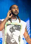 Omarion performs onstage during 'The Millennium Tour' at State Farm Arena on April 4, 2025 in Atlanta, Georgia.