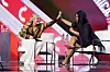 Erika Kirk and Nicki Minaj high-five during an interview on the final day of Turning Point USA's annual AmericaFest conference at the Phoenix Convention Center on December 21, 2025 in Phoenix, Arizona.