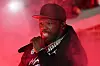 50 Cent performs at halftime during the 2025 College Football Playoff First Round Game between the Oklahoma Sooners and the Alabama Crimson Tide at Gaylord Family Oklahoma Memorial Stadium on December 19, 2025 in Norman, Oklahoma.