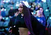 Megan Thee Stallion, American rapper and songwriter walks off the court at half time during the game between the Dallas Mavericks and Sacramento Kings at Golden 1 Center on December 27, 2025 in Sacramento, California.