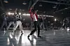 Jaafar Jackson as Michael Jackson leads dancers in a studio rehearsal