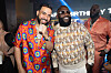 Guests pose and smile at a nightclub birthday party in Miami.