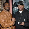 Kanye West and Damon Dash posing together at a film premiere event