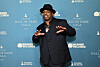 Daz Dillinger stands on a blue carpet in front of a GRAMMY Hall of Fame Gala backdrop.