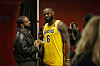 Drake speaks with LeBron James in a Lakers jersey after an NBA game at Scotiabank Arena.