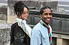 ASAP Rocky and Rihanna stand together outside the Dior Homme show venue during Paris Fashion Week.