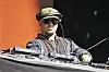 DJ Joe Kay performs at a booth with equipment during the 2026 Roots Picnic in Philadelphia.