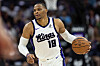 Sacramento Kings guard Russell Westbrook #18 dribbles the ball during a game against the Chicago Bulls.