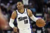Sacramento Kings guard Russell Westbrook #18 dribbles the ball during a game against the Chicago Bulls.