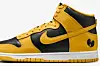 A yellow and black sneaker with a wu tang logo.