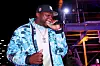 50 cent hat holding mic