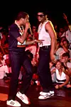 Joseph 'Run' Simmons and Darryl 'D.M.C.' McDaniels perform on stage during the Together Forever Tour on July 29, 1987 at the Pine Knob Music Theater in Clarkston, Michigan.