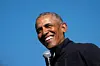 Former U.S. President Barack Obama speaks during a drive-in campaign rally for Democratic presidential nominee Joe Biden at Northwestern High School on October 31, 2020 in Flint, Michigan.