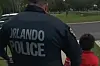 Orlando Police Officer Arresting Child