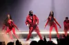 Diddy wearing all red performing