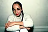 Sade in a white sweater