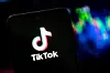 In this photo illustration a tiktok logo seen displayed on a