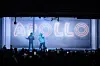 Drake on stage with 21 Savage with the classic Apollo sign behind them