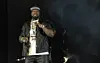 50 cent holding a mic