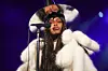 Erykah Badu live silver hat