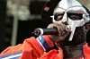 Rapper MF DOOM performs at a benefit concert for the Rhino Foundation at Central Park's Rumsey Playfield on June 28, 2005 in New York City.