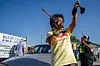 Community member Jackie Douglas celebrates after residents marched from the Galveston County Courthouse on June 19, 2022 in Galveston, Texas. Galveston island is the birthplace of Juneteenth, the oldest known nationally celebrated event commemorating the end of slavery in the United States.