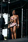 Ari Lennox in pink top