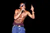 Rapper Tupac Shakur (Lesane Parish Crooks, name later changed to Tupac Amaru Shakur) performs at the Regal Theater in Chicago, Illinois in March 1994.