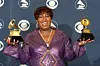 2000s hip-hop fashion Singer Missy Elliot poses with her awards during the 44th Annual Grammy Awards at Staples Center February 27, 2002 in Los Angeles, CA. Elliot won Best Rap Solo Performance for 'Get Ur Freak On' and Best Pop Collaboration With Vocals for 'Lady Marmalade.' (Photo by Vince Bucci/Getty Images)