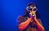 MF DOOM holding mic