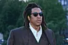 jay-z wearing glasses brown suit