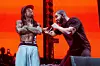 Lil Wayne (L) and Drake perform at Lil Weezyana Festival at Champions Square on August 28, 2015 in New Orleans, Louisiana (photo by Josh Brasted).