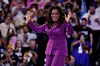 Oprah Winfrey arrives to speak on stage during the third day of the Democratic National Convention at the United Center on August 21, 2024 in Chicago, Illinois.