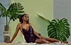 Jaz Elise in front of plants