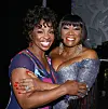 Patti LaBelle and Gladys Knight hugging