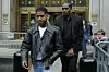 Kid Cudi (L) leaves the federal court after appearing at the Sean 'Diddy' Combs sex trafficking trial in New York City on May 22, 2025.