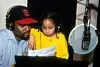 Seven-year-old Raven-Symoné works with Producer Hitman Howie Tee (aka Howard Thompson) when she records her 'Here's To New Dreams' album and CD at Soundtracks Studios on May 15, 1992 in New York City