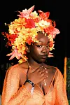 person with flowers on her head